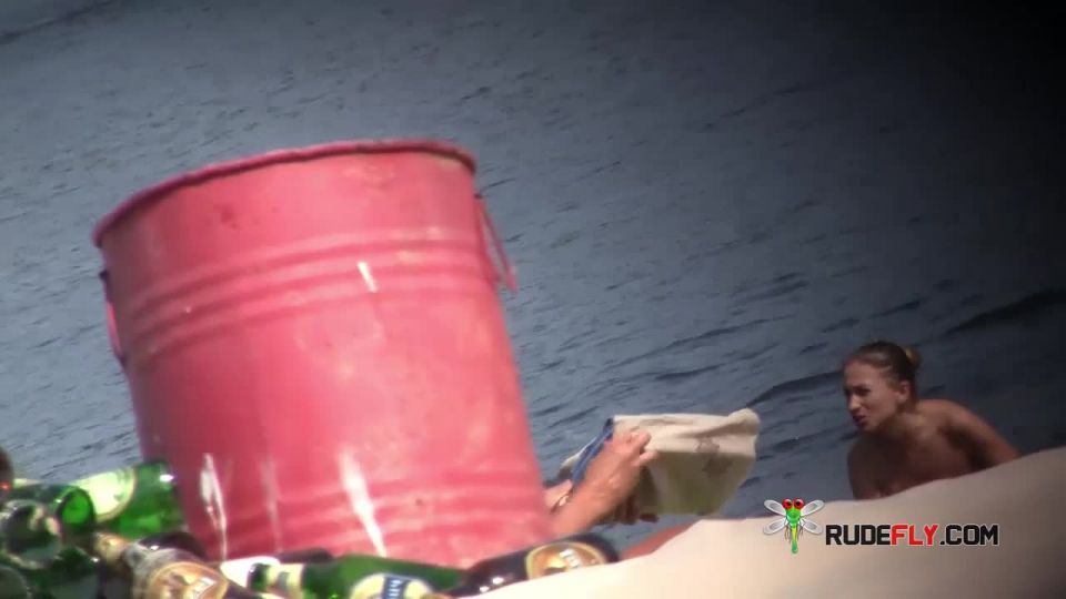 Young nudists fumble grease on each other's naked  bods