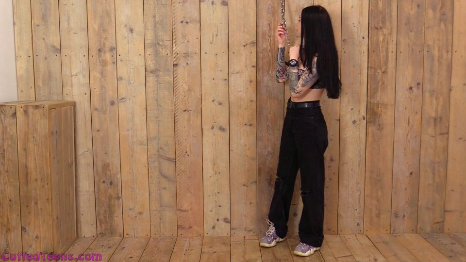 Vivian Wood - neck cuffed during stripping - BDSM