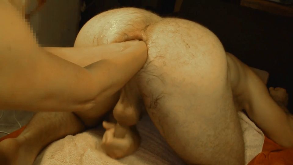 Wife's fists deep in asshole of her husband.