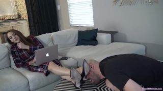 Miss Stella is working on her schedule while ignoring her slave whose ...