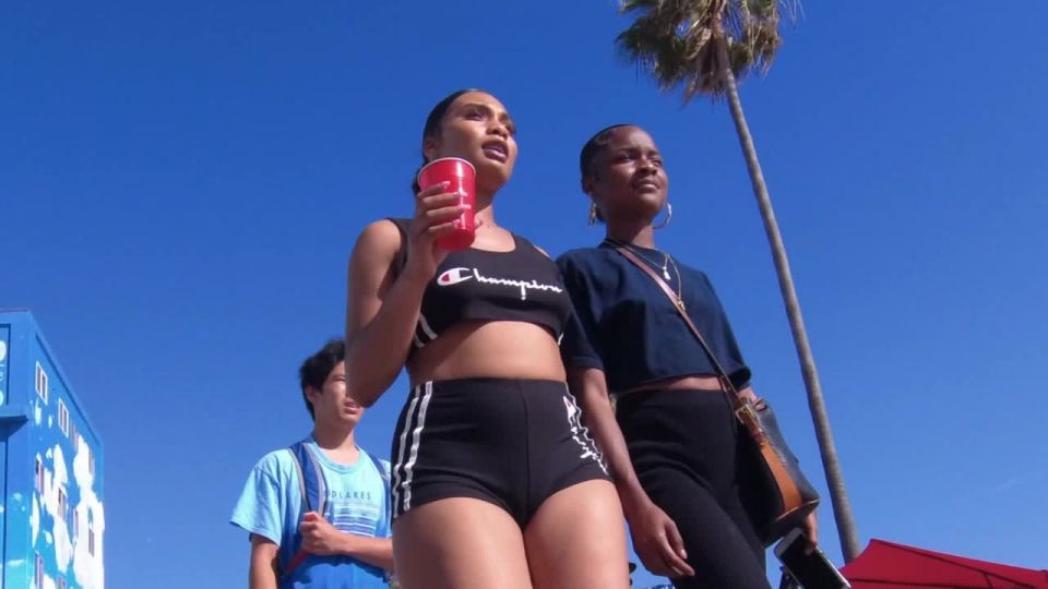 big_ass_brunette_with_short_tight_hot_spy