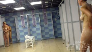Hidden-Zone.com- Sh1419 One of the girls wipes by towel her large white chest near Hidden cam shower. It is truly 