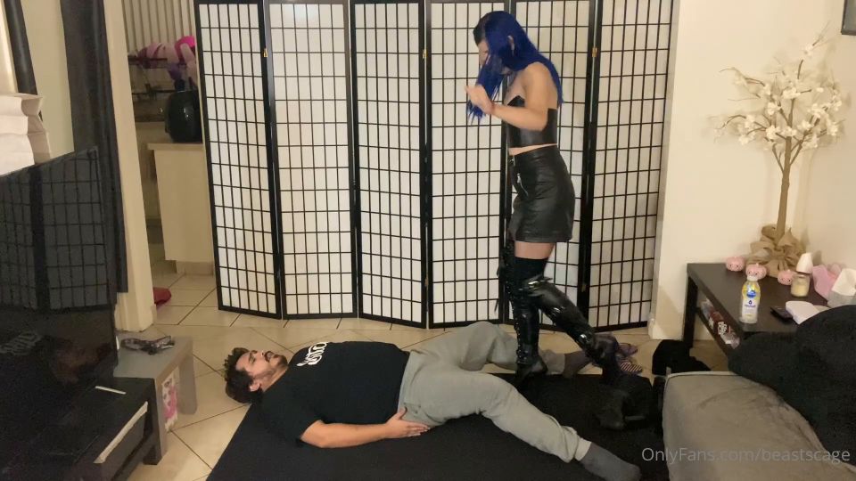 Girl in boots beats guy in the balls.