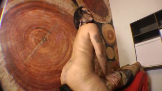 GIANT MISTRESS SMOTHERING THE SKINNY SLAVE IN ARMCHAIR D...