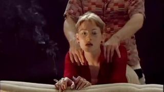 Blonde in red smokes and fucks.