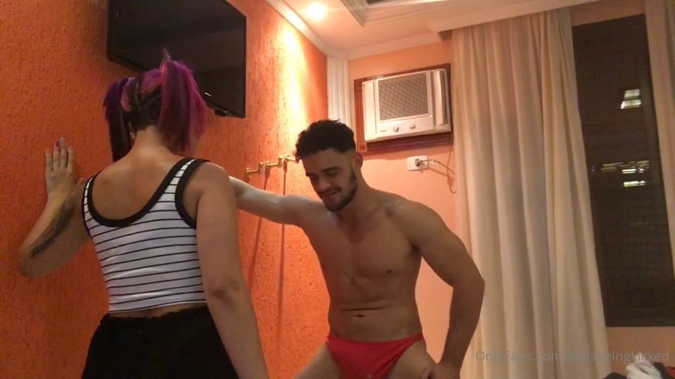 After training, the guy gets hit in the balls.