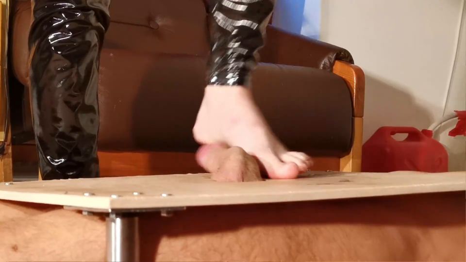 Barefeet cock stomping slapping and massage in latex pants.