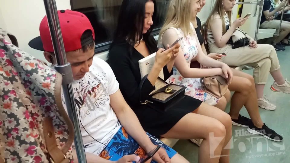 Hidden-Zone- Up3033 Under the skirt of a slender brunette in a short black dress. Our operator several times put