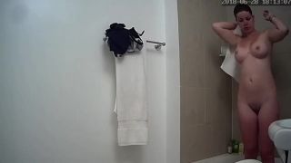 Super busty girl taking a shower. hidden cam