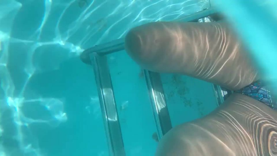 Swimming around a girl to videotape her crotch