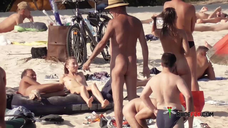 Brunette teen models nude and puffs a cigarette nudism 