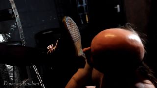 Cleaning Her Dusty Boots.