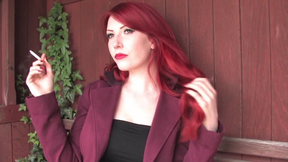 Beautiful Red Head Smokes Marlboro Reds At The Bus Stop Wearing Fishnets.