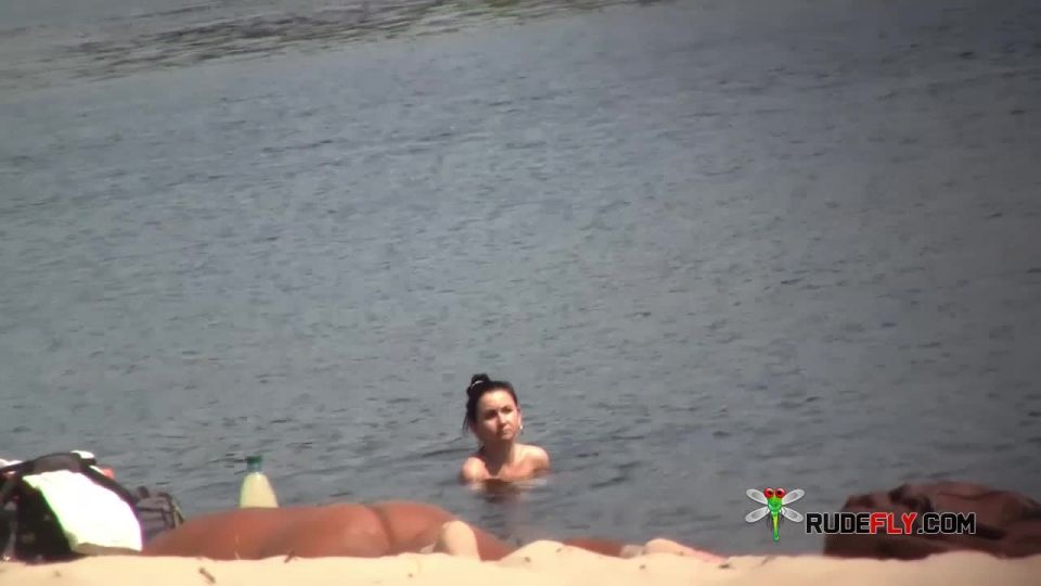 Naturist doll not shy about posing nude at the plage  2