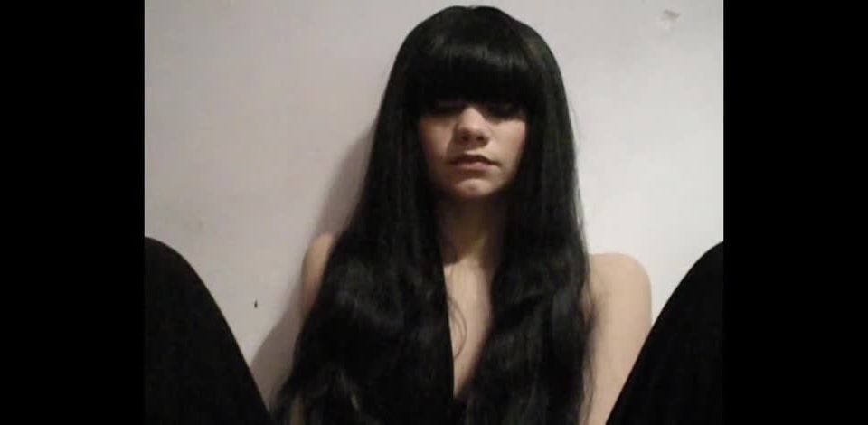 Long Haired Bitch Smoking A Cigarette.