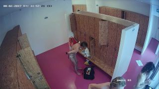 Hidden-Zone.com- Lo2141 After the shower, the women return to the dressing room and again we see many naked bodies. 