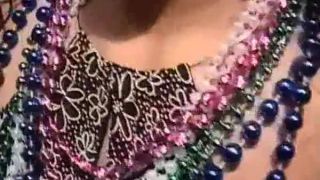 Wild mardi-gras chicks flashing tits