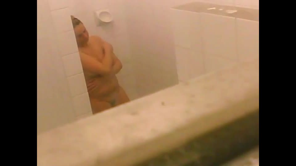 Women peeped as they chat in a shower Voyeur