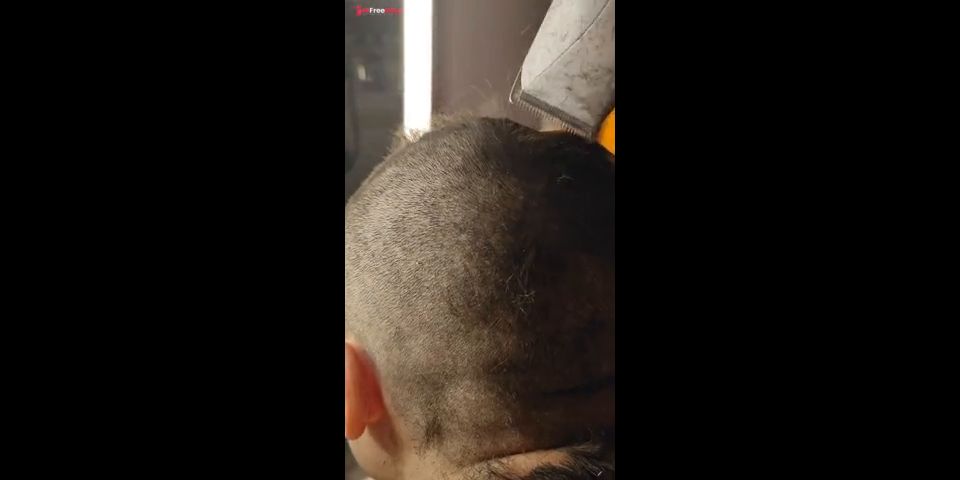 Shaving my head with an electric razor